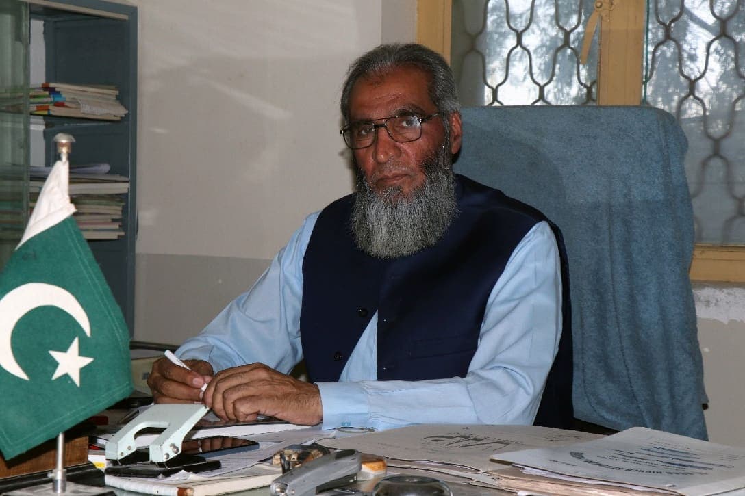 Prof. Engr. Iqbal Zeb Khattak at his desk